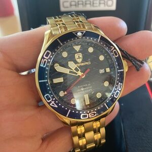 Brand New Carrero Avatar II Men’s blue-face, gold watch in stainless.